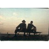 Richard Lebredo & Dale McKnight sitting on a cot on top of the bunker outside our Hooch. It was a great place to watch the incoming from.