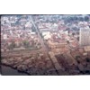 Saigon, note the slums built along the river in the foreground